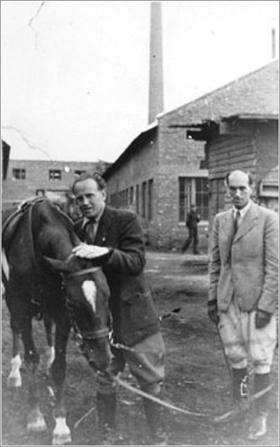 Oskar Schindler with his horse on the grounds of the Emalia enamelworks in Krakow-Zablocie